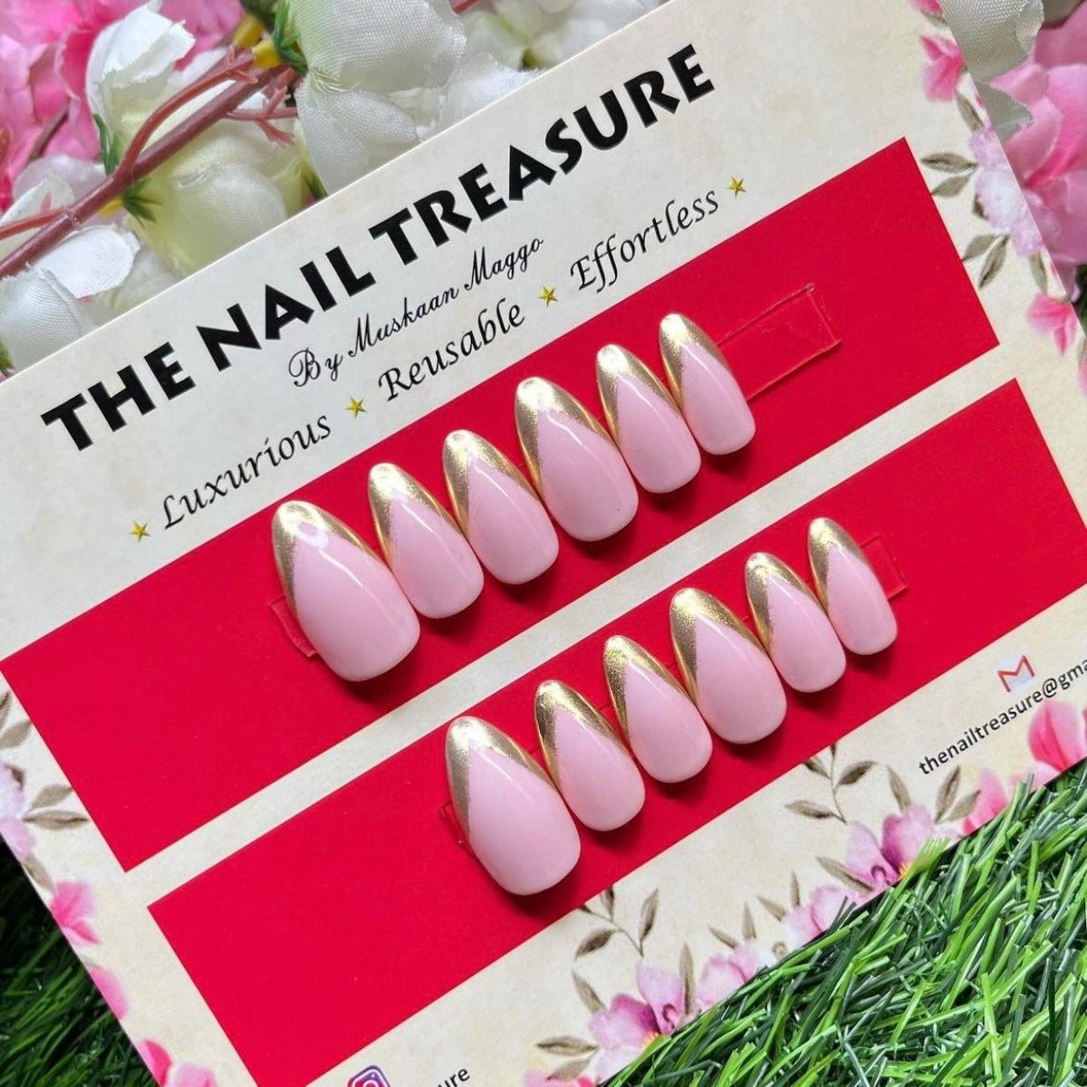 Classic Queen Chrome french art press on nails set on soft pink base.