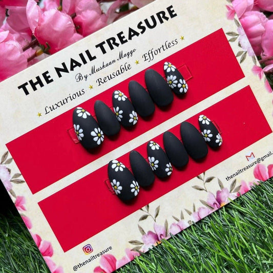 Black Daisies- Beautiful floral art Fake Nails in black color. Best fake nails in floral collection.