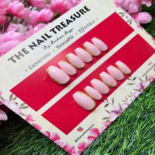 Premium press on nails design by the nail treasure, These fake nails designed on a nude pink base with golden accents.