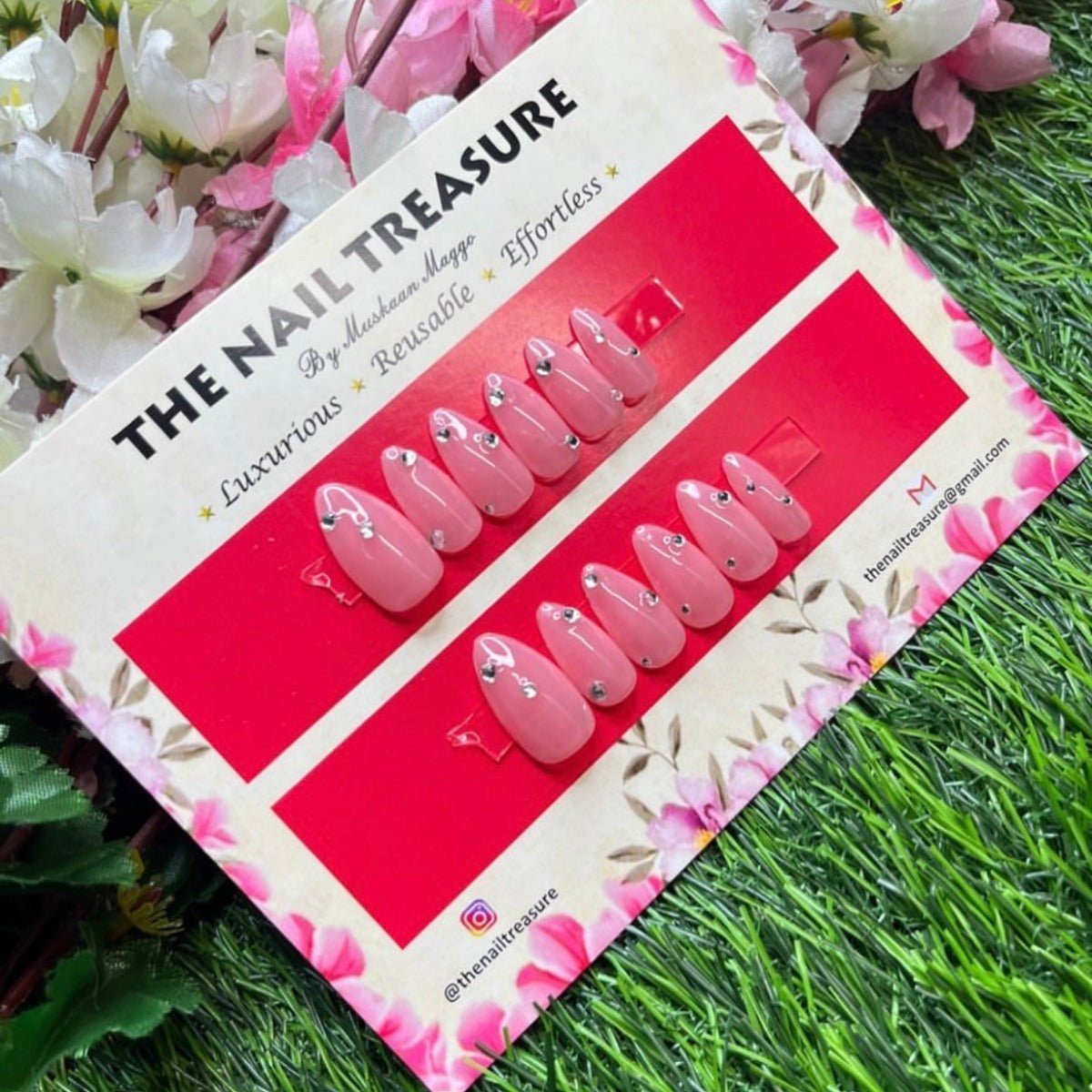 Subtle press on nails set by the nail treasure. these fake nails are designed on nude base with studded subtle stones