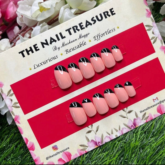 Fancy Mani- French art Press on nail set designed with Light Base pink with highlighted black french art.