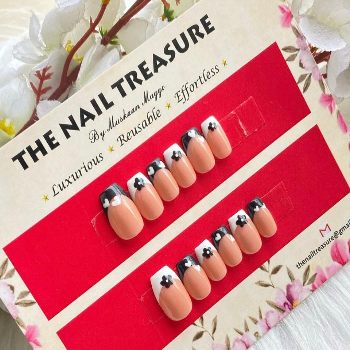 Blair- French press on nails designed with flower art on a nude base. your one stop place for fake nails in india